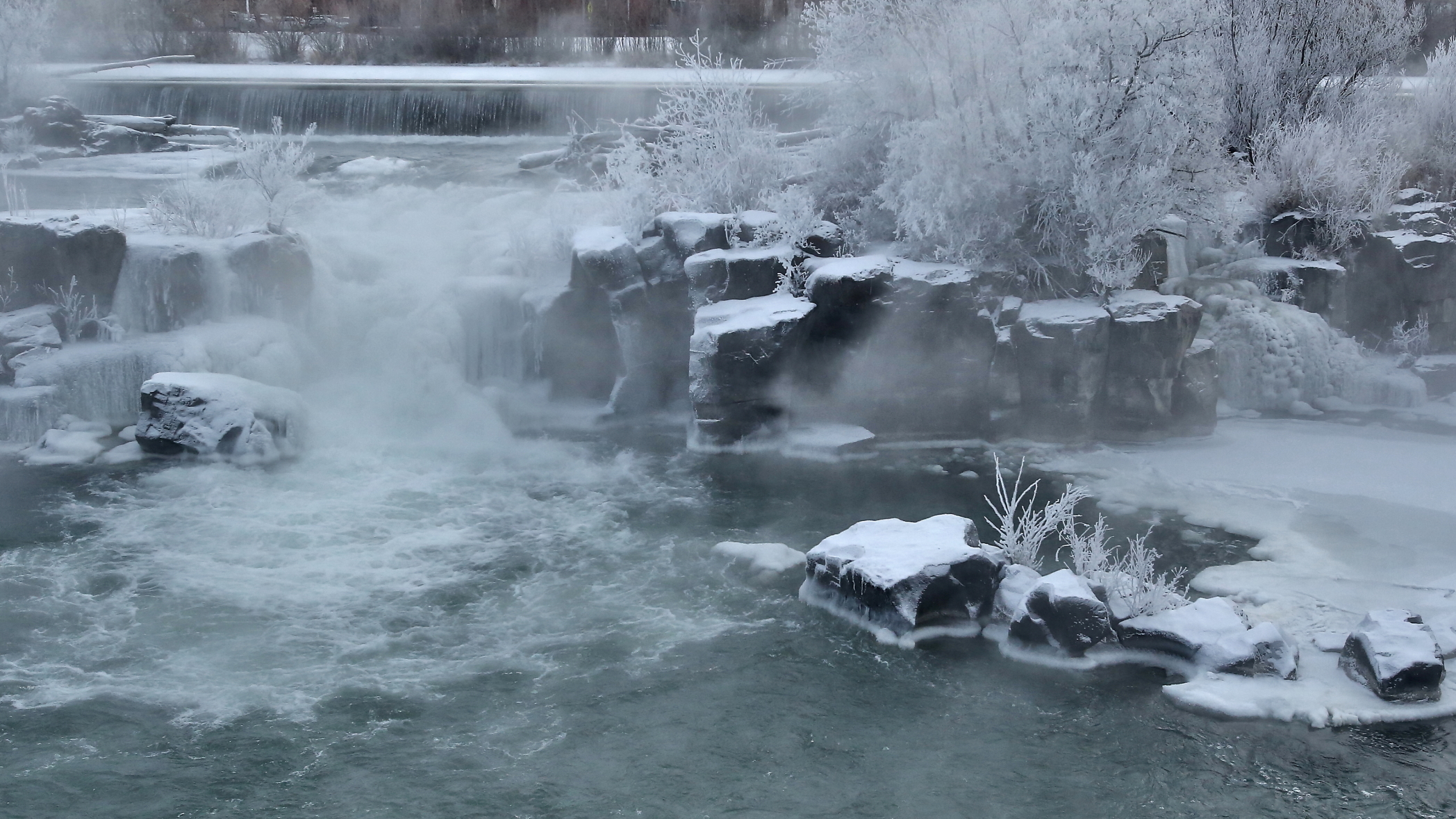 Idaho hot springs amid snow and steam